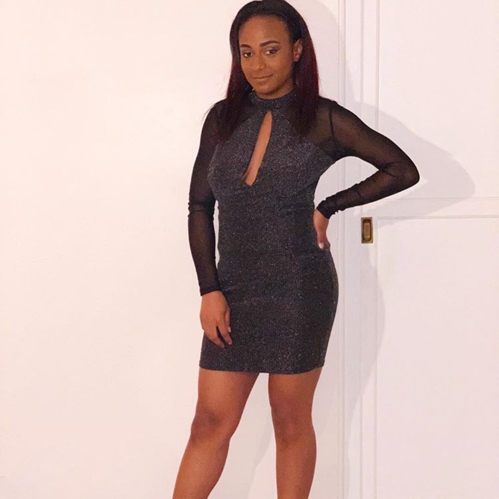 Long-sleeved black and sparkled dress